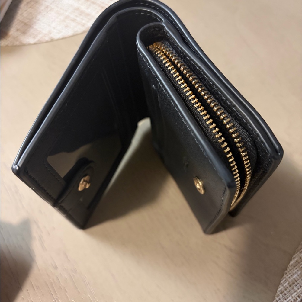 Coach Black Leather Wallet with Gold Accents